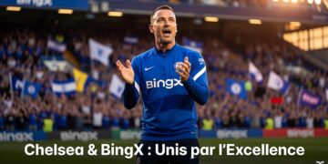 Représentants de BingX et Chelsea FC serrant la main devant un panneau aux couleurs des deux marques, symbolisant leur partenariat renouvelé.